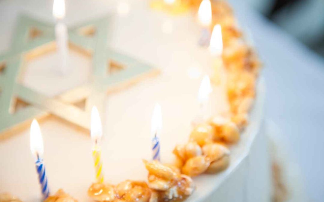 Bar Mitzvah cake with candles.